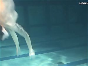 Lozhkova in witness thru cut-offs in the pool